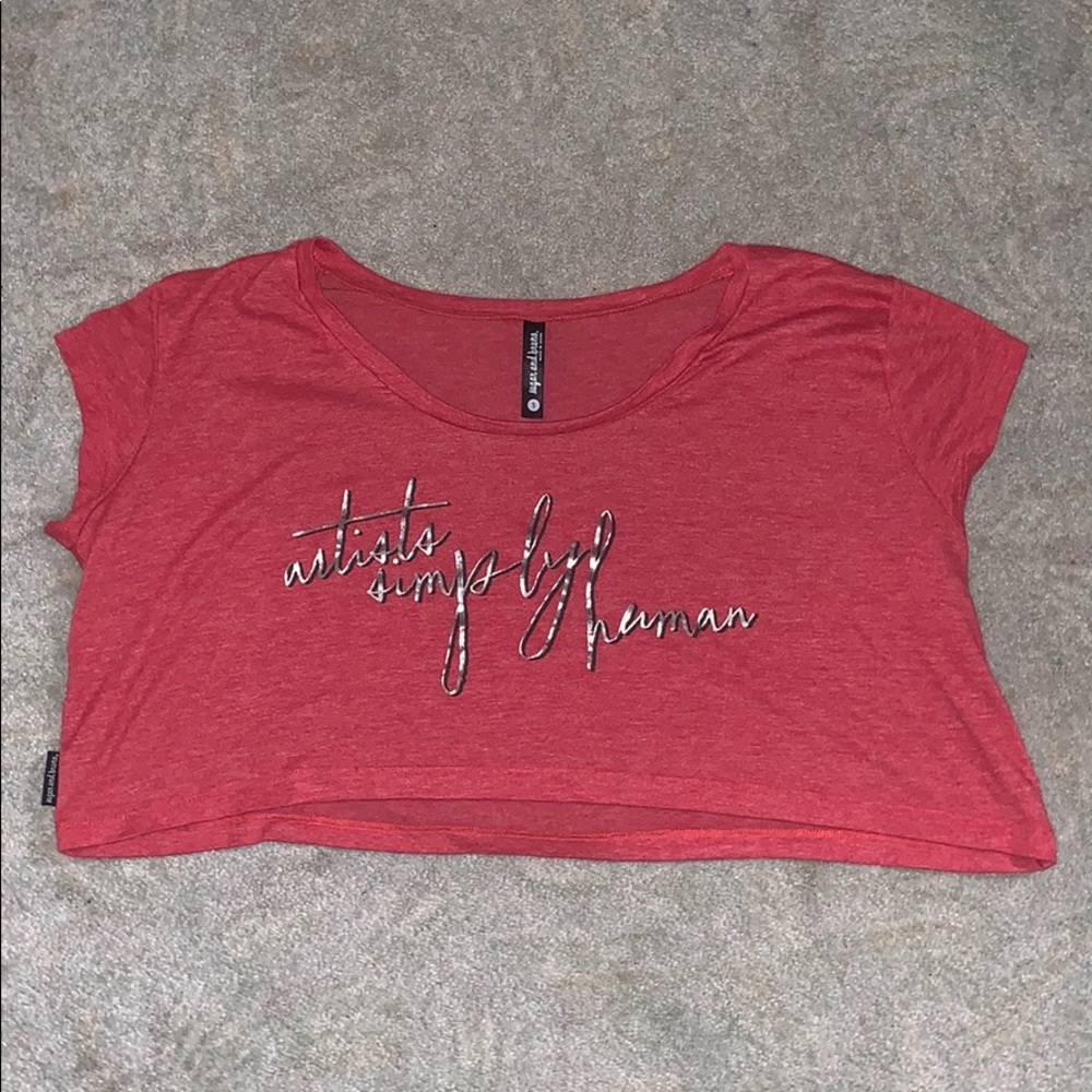 Red “artist simply human” cropped t shirt.